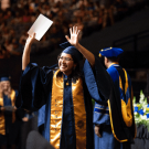 Undergraduate celebrates at the 2023 UC Davis Commencement. 